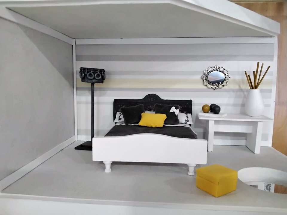 Dormitorio gris -amarillo